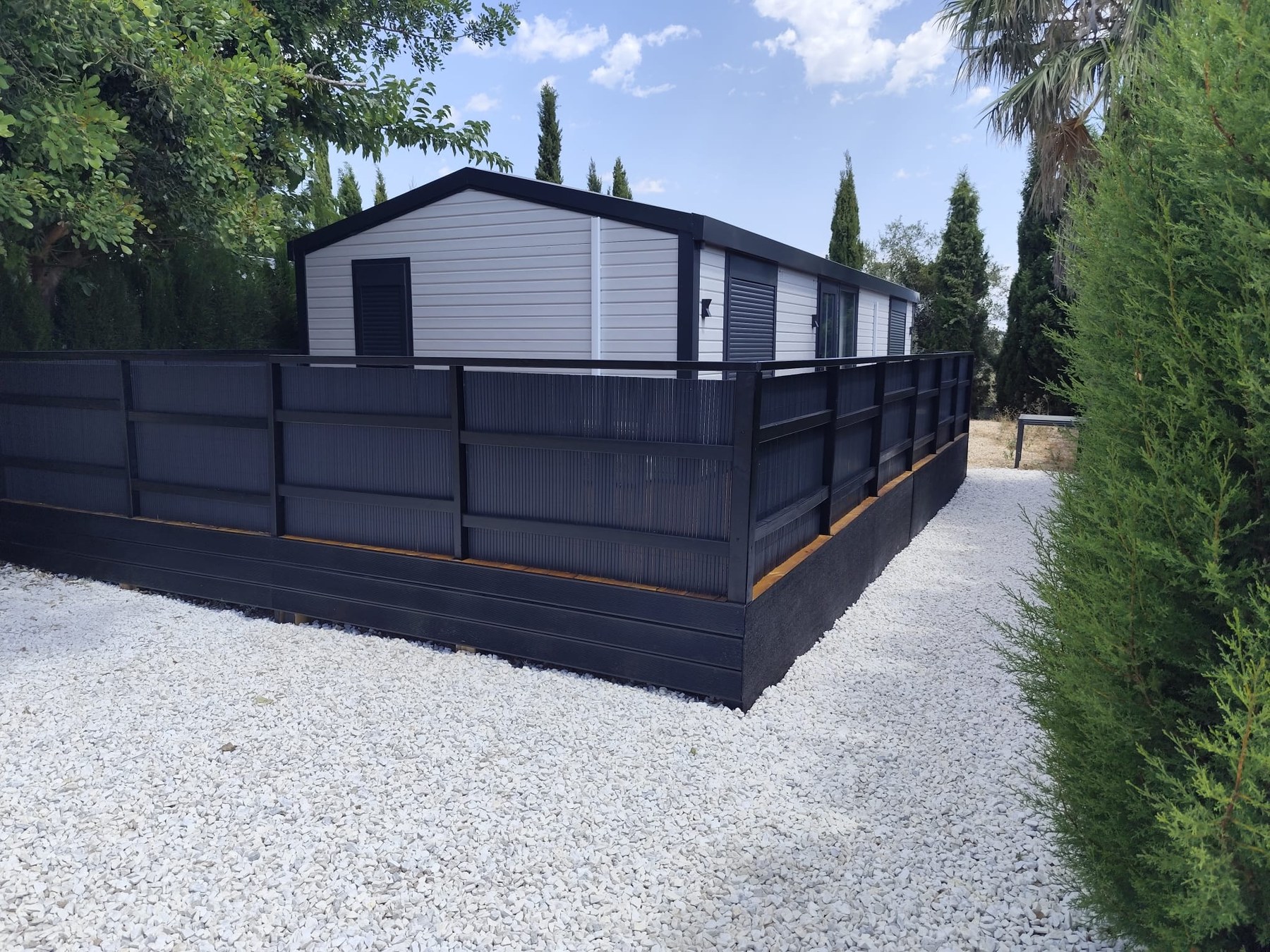 Completed ARB project with white marble and black terrace